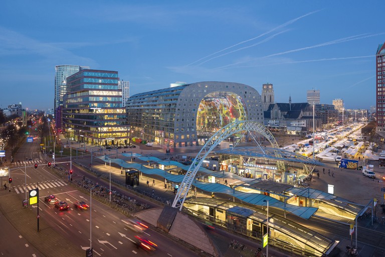 Aerial view of the Markthal at dusk, looking North West over Blaak station. ©Ossip van Duivdenbode