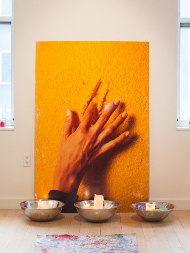 Bettina Werner's hand creating on a texturized salt crystal surface.